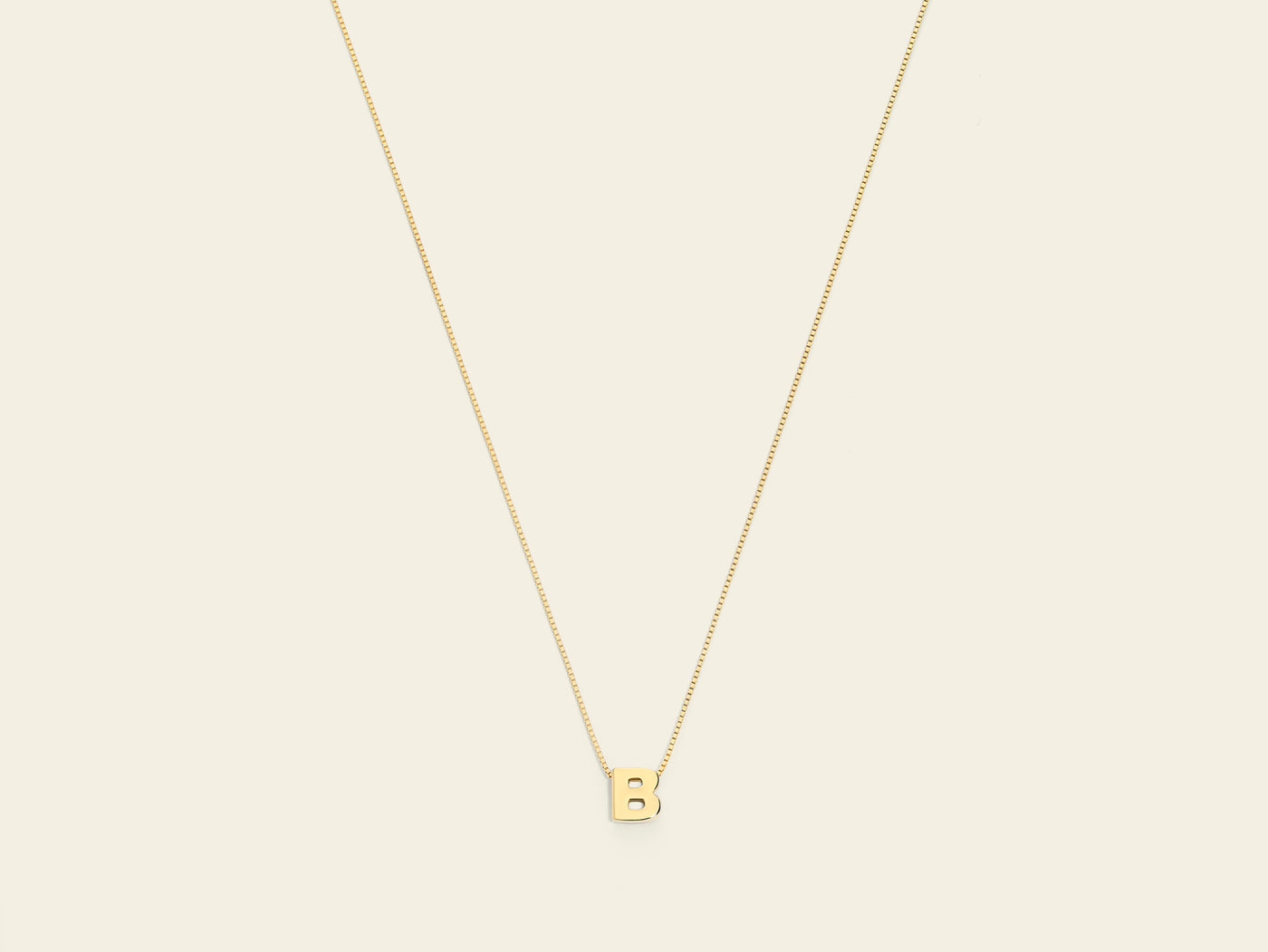 Collana con iniziale in oro