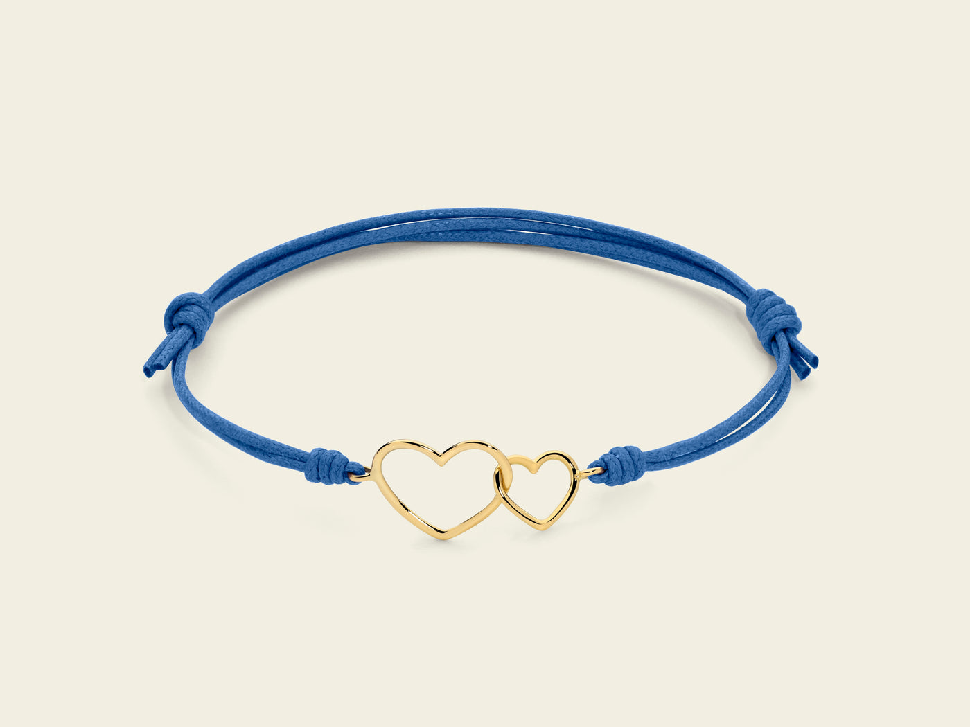 Bracciale cordino con cuori intrecciati 3